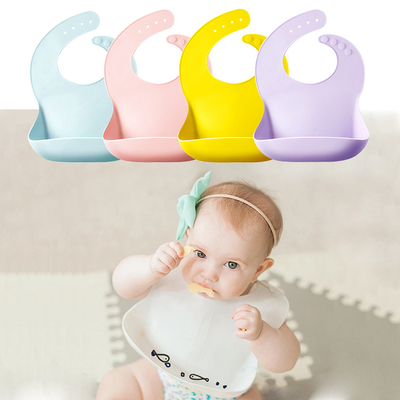 Os babadores 2022 impermeáveis quentes do bebê do silicone do produto comestível da venda das Amazonas vendem por atacado com bolso do coletor